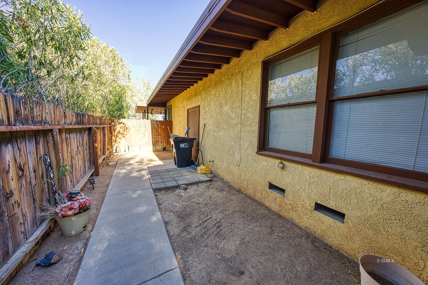 112 South Valley Street Ridgecrest, CA 93555 - Photo 9 of 19 a view of a house with a backyard