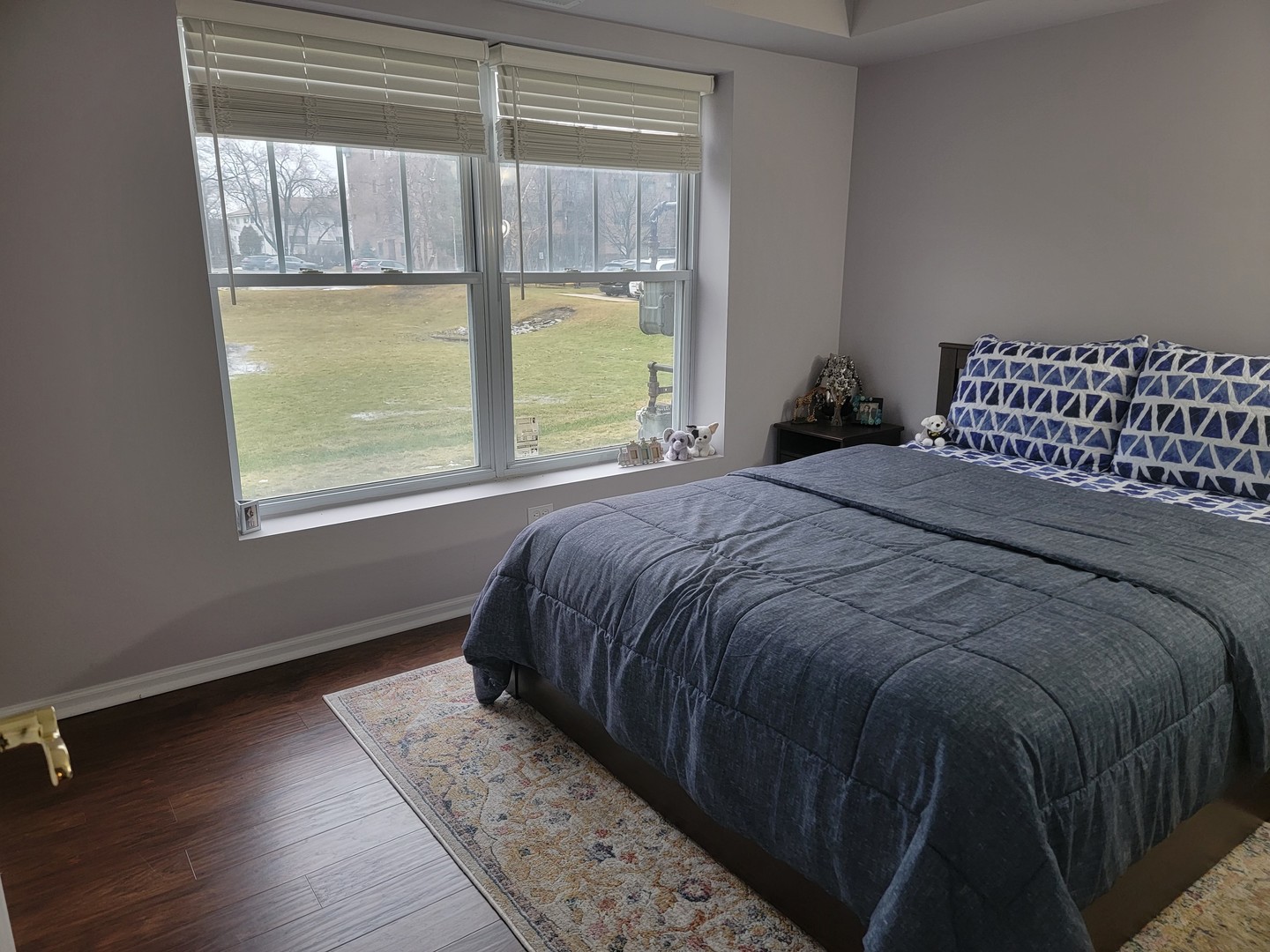 237 North Mill Road, Unit 3 Addison, IL 60101 - Photo 15 of 23 a bed sitting in a bedroom next to a window
