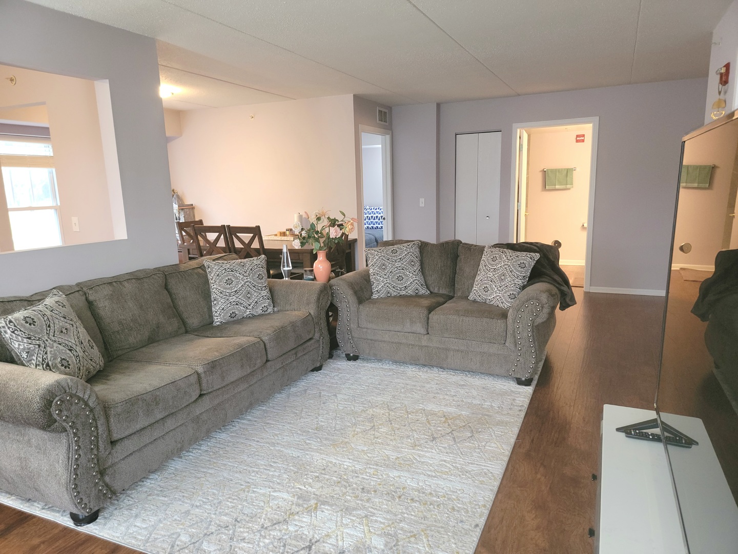 237 North Mill Road, Unit 3 Addison, IL 60101 - Photo 2 of 23 a living room with furniture and a couch