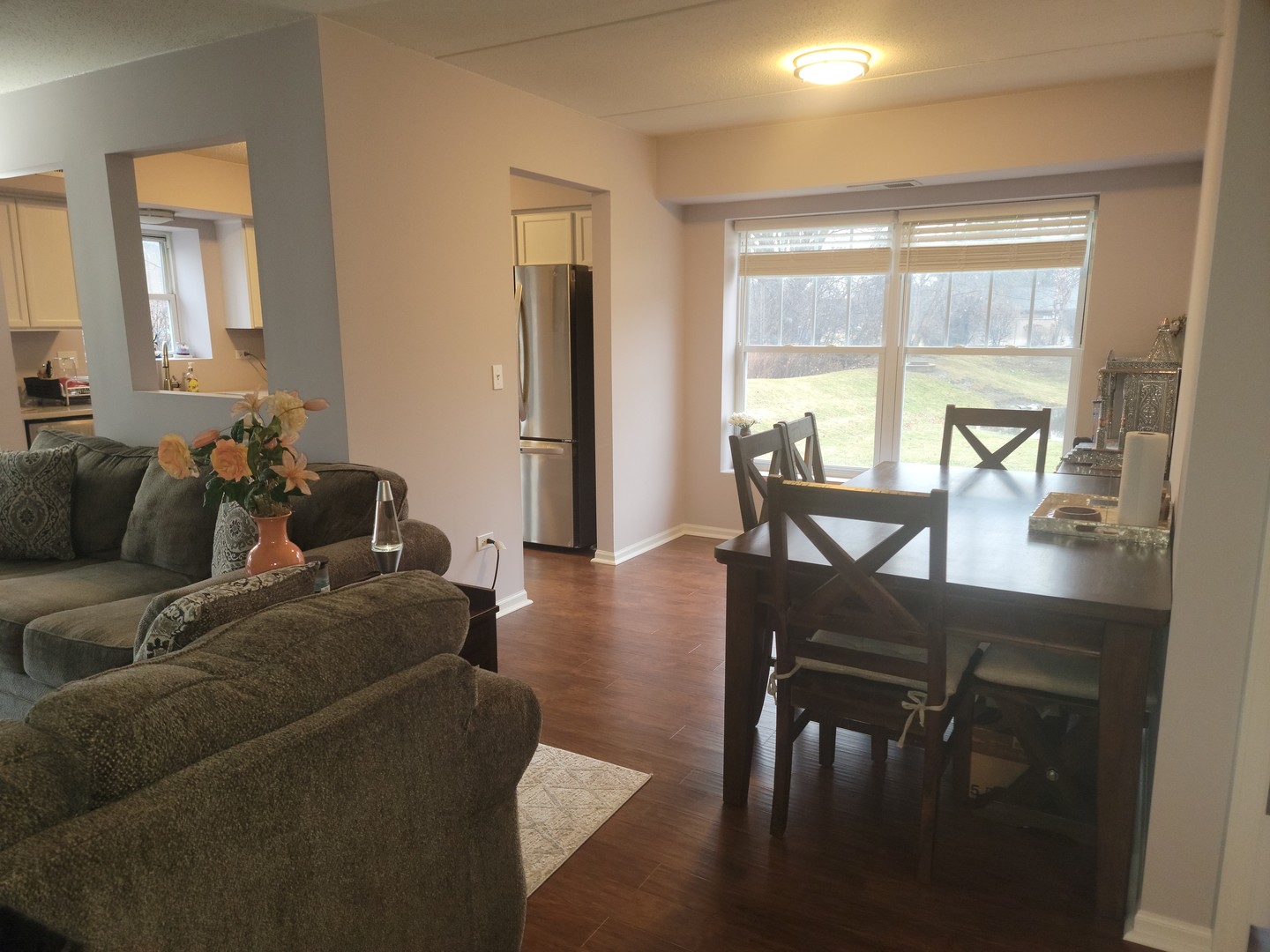 237 North Mill Road, Unit 3 Addison, IL 60101 - Photo 5 of 23 a living room with furniture and large windows