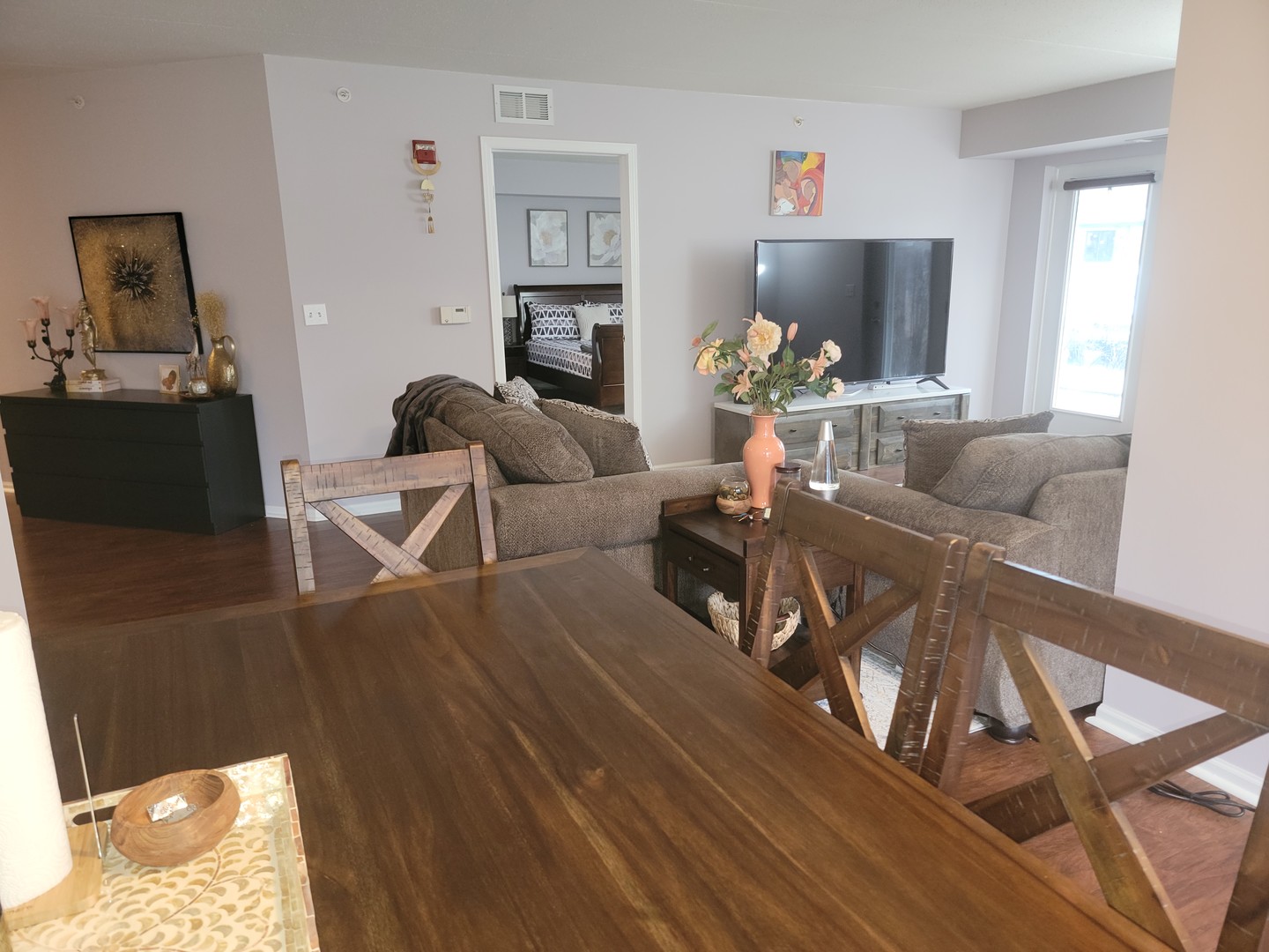 237 North Mill Road, Unit 3 Addison, IL 60101 - Photo 6 of 23 a living room with furniture and a flat screen tv