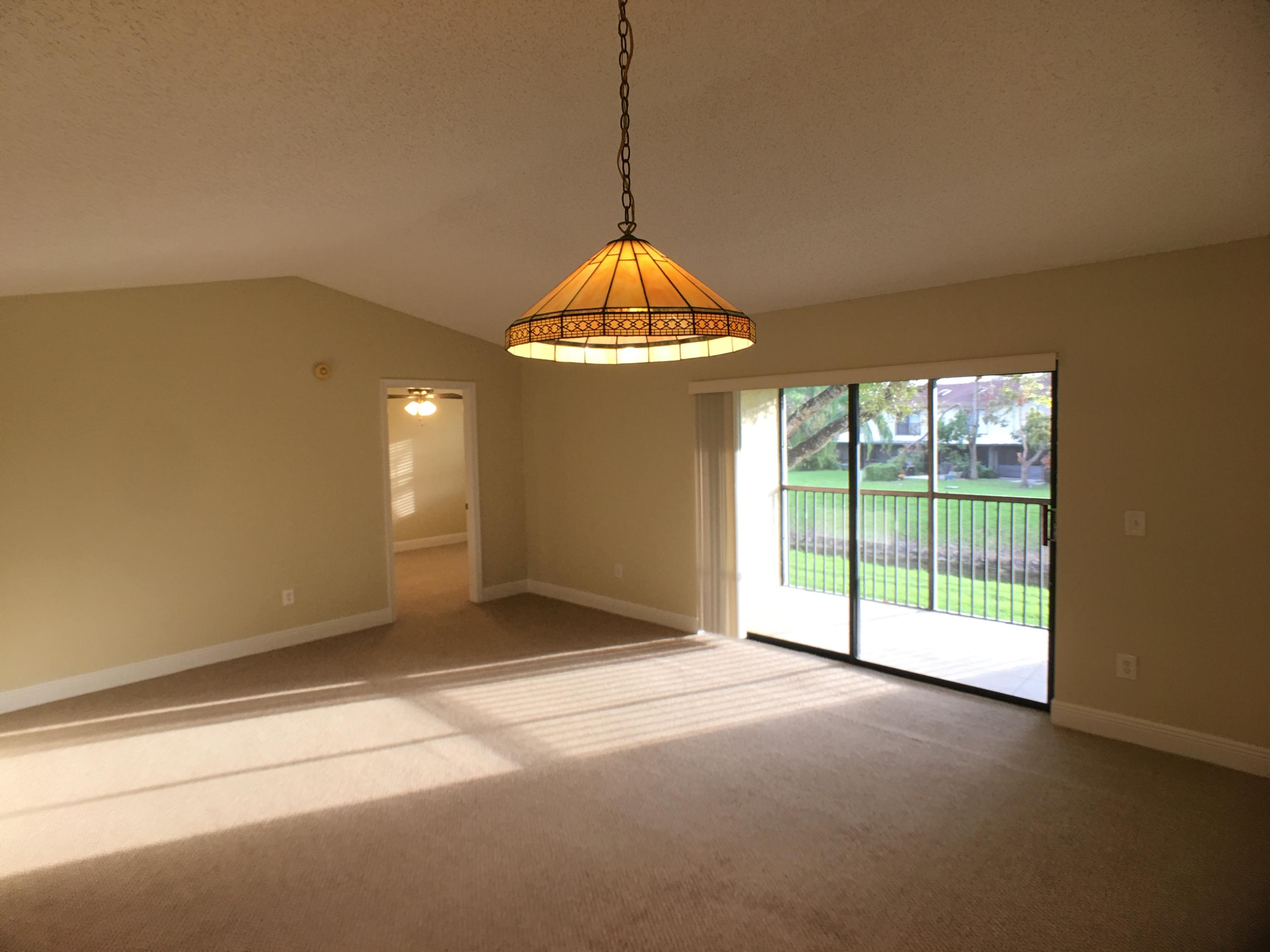 23398 Southwest 57th Avenue, Unit 309 Boca Raton, FL 33428 - Photo 8 of 29 a view of a room with natural light