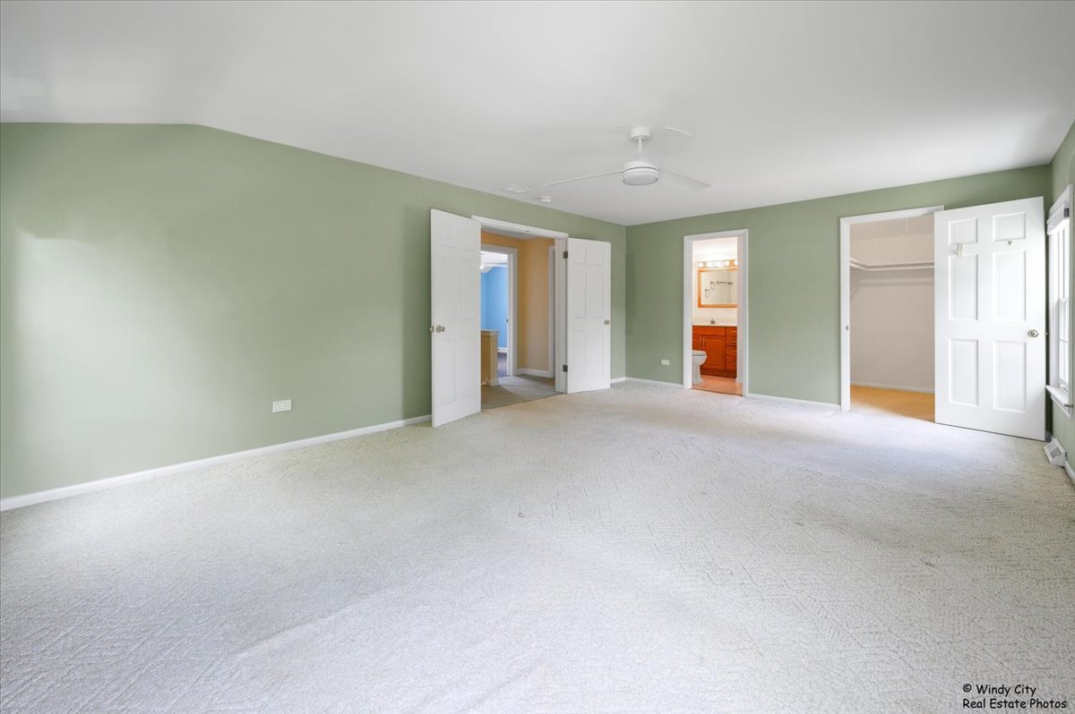 420 North Wille Street Mount Prospect, IL 60056 - Photo 13 of 28 a view of a livingroom with an empty room and a window