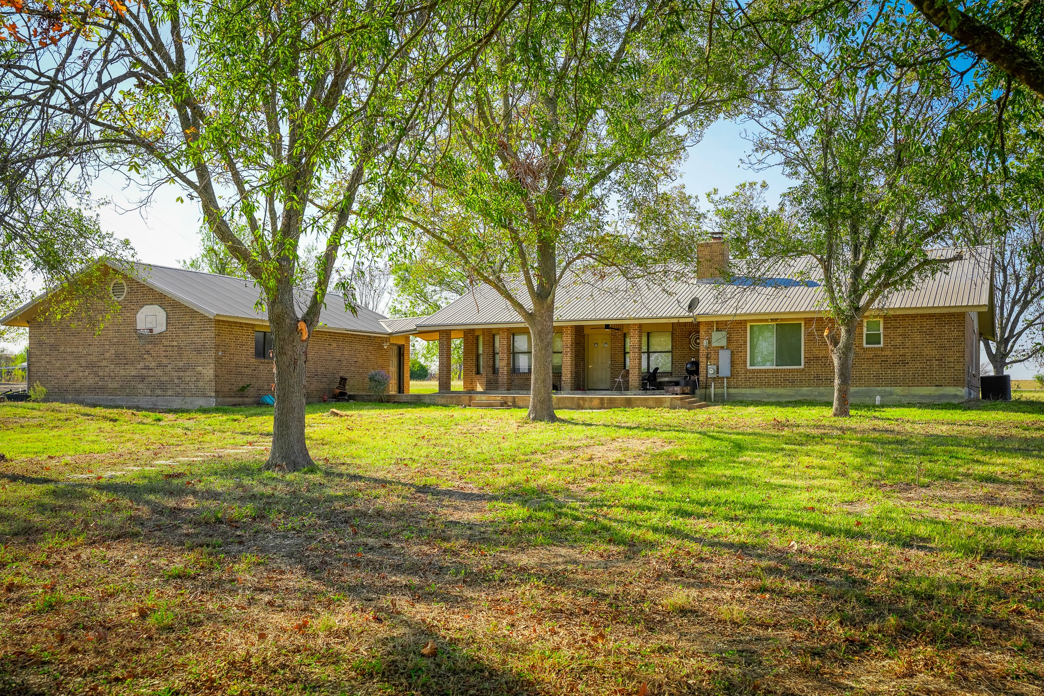 17901 Steger Lane Manor, TX 78653 - Photo 13 of 18 a front view of a house with a garden