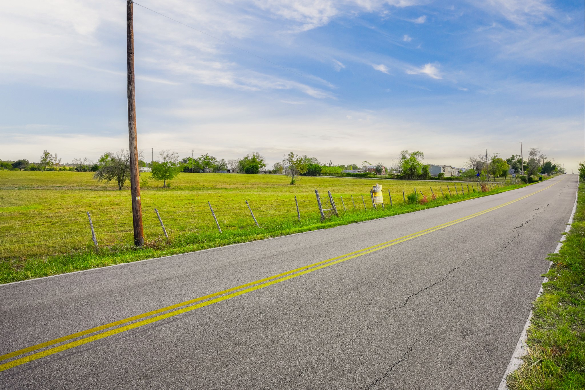 17901 Steger Lane Manor, TX 78653 - Photo 9 of 18 a view of a road with a big yard
