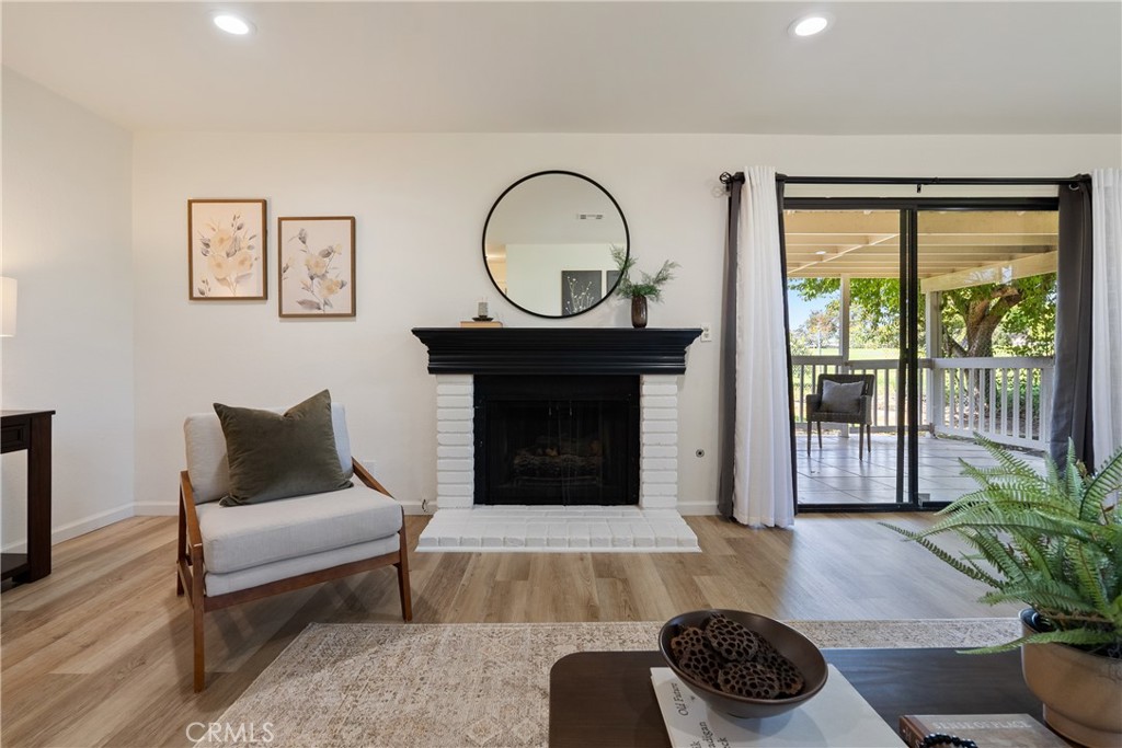 10 Flag Way, Unit C Paso Robles, CA 93446 - Photo 5 of 32 a living room with furniture and a fireplace