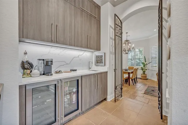 a kitchen with stainless steel appliances granite countertop a sink and cabinets