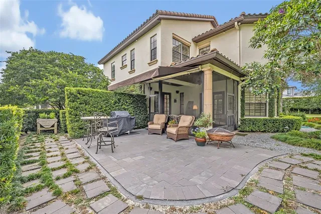 a view of a house with sitting area and furniture