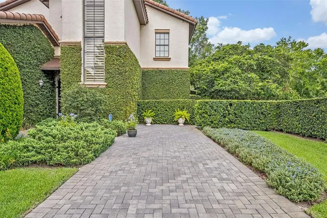 a view of a yard and front view of a house