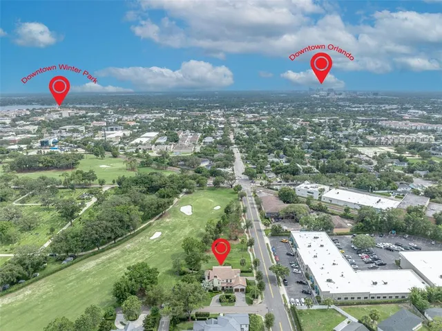 a view of city and swimming pool