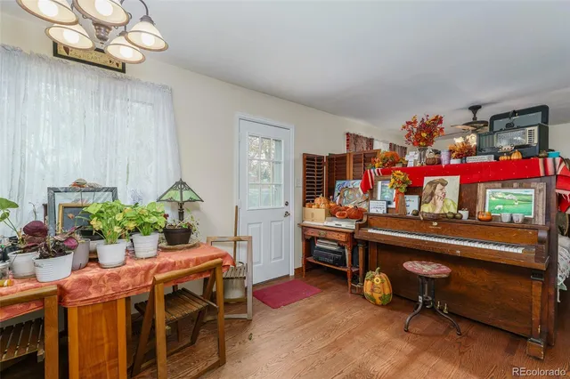 a room with furniture and a chandelier