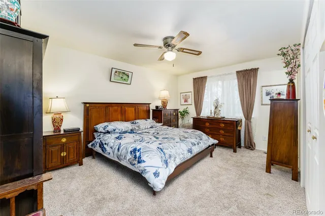 a view of a livingroom with furniture and a chandelier