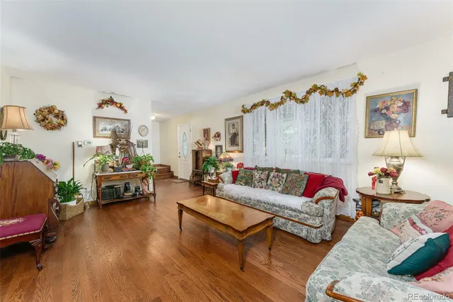 a living room with furniture and a couch