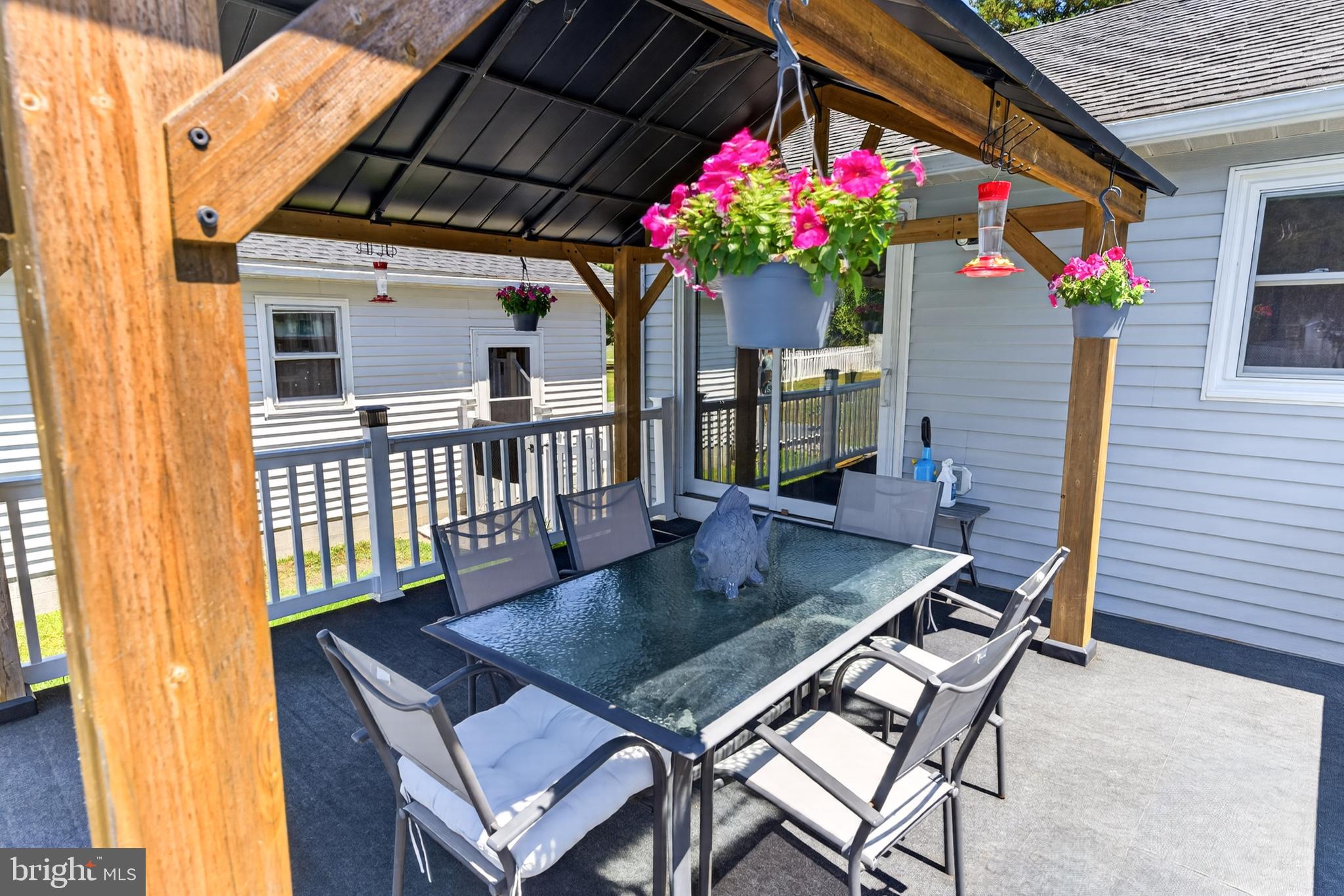 5440 Moose Lodge Road Cambridge, MD 21613 - Photo 45 of 63 Rear deck w/ covered entertaining space!