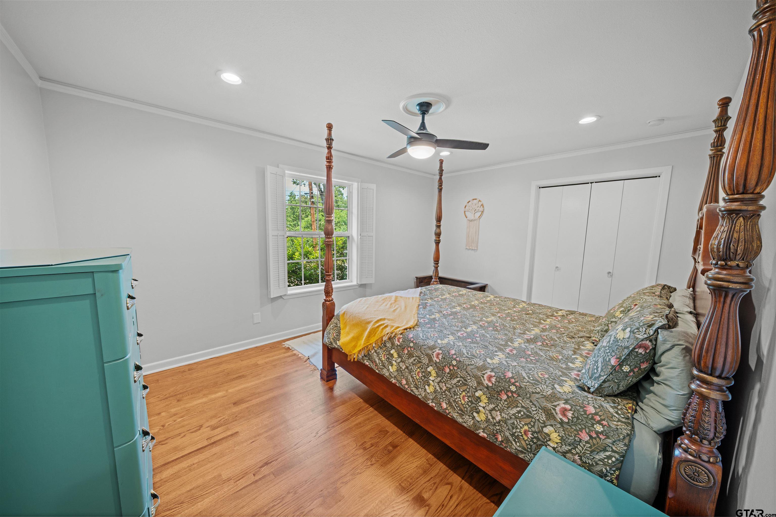 917 Rhodes Drive Tyler, TX 75701 - Photo 20 of 27 a bed room with a bed and a window