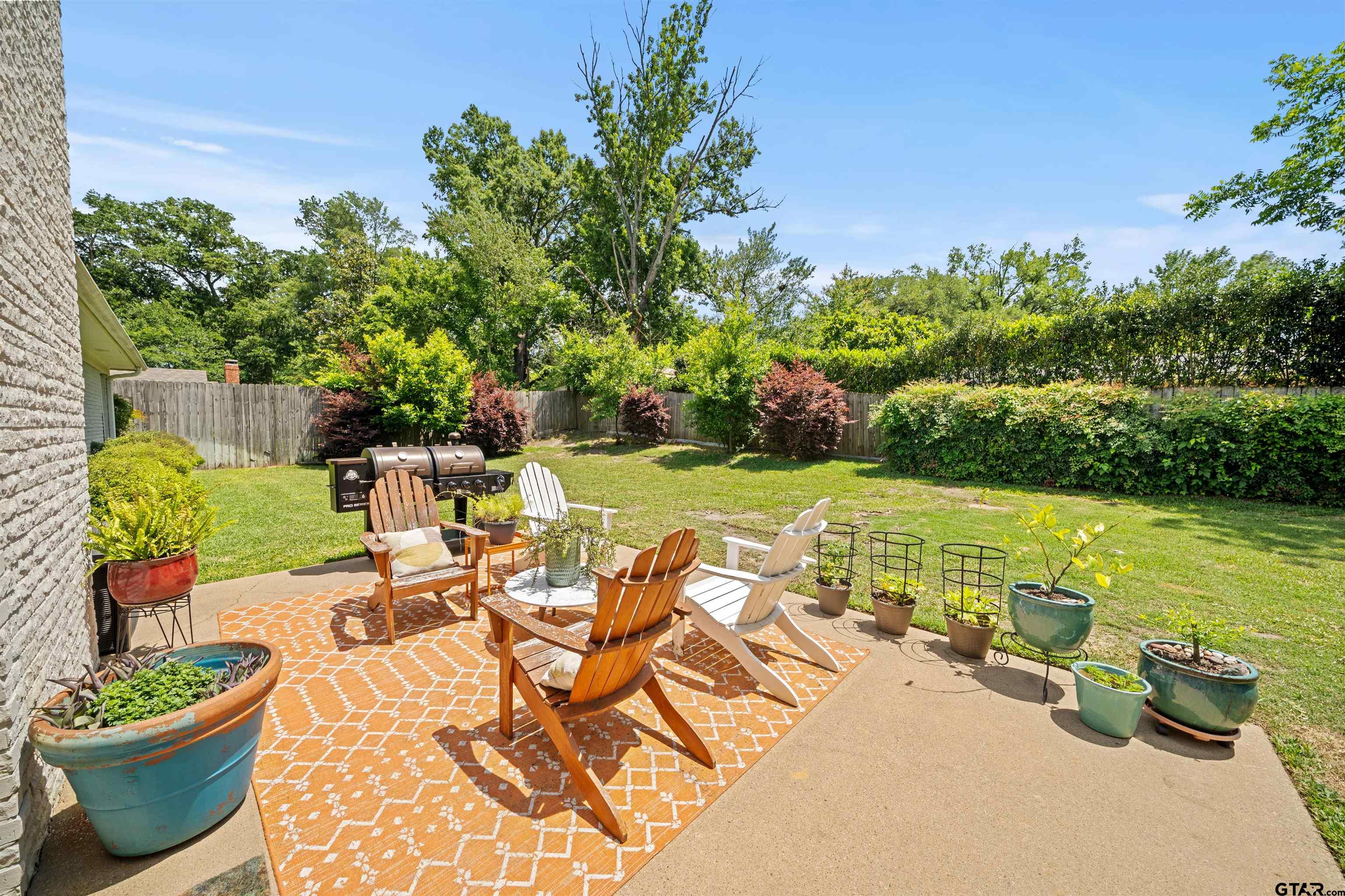 917 Rhodes Drive Tyler, TX 75701 - Photo 22 of 27 a view of a swimming pool and lounge chair
