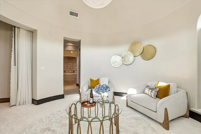 a media room with lots of chairs and a projector screen