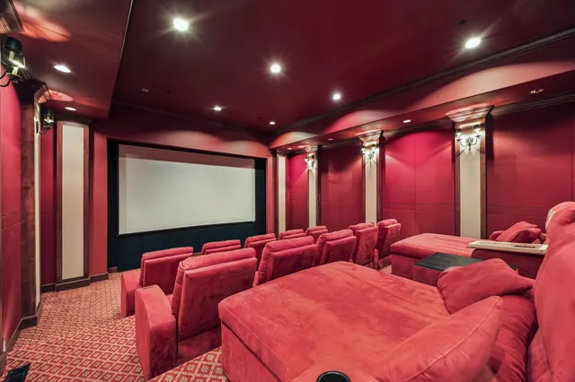 a view of a swimming pool with seating area