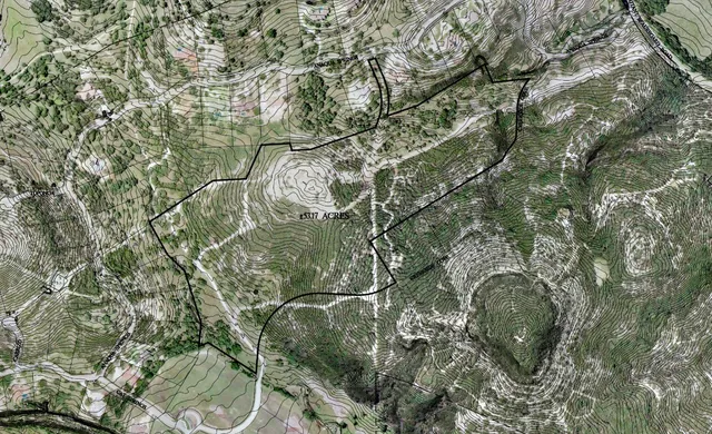 a very nice looking living room with a large window and a chandelier