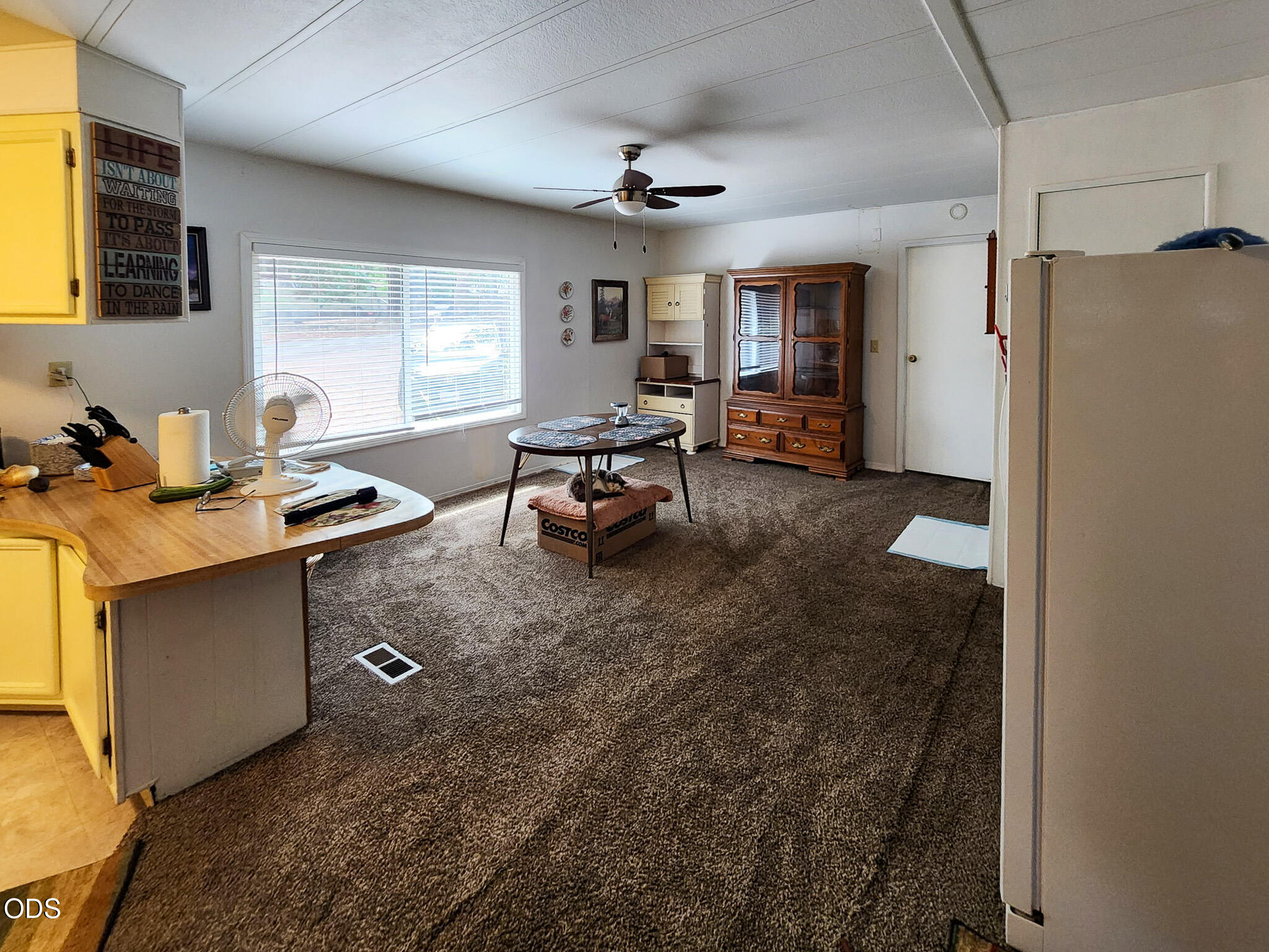 350 Hamilton Avenue Cave Junction, OR 97523 - Photo 12 of 34 a view of a workspace with furniture and a window