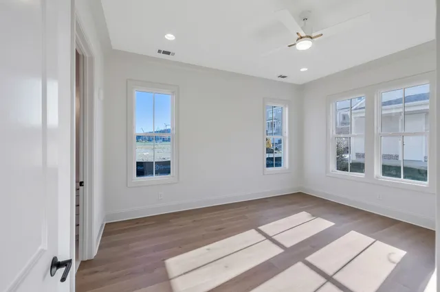 a bathroom with a double vanity sink mirror and shower