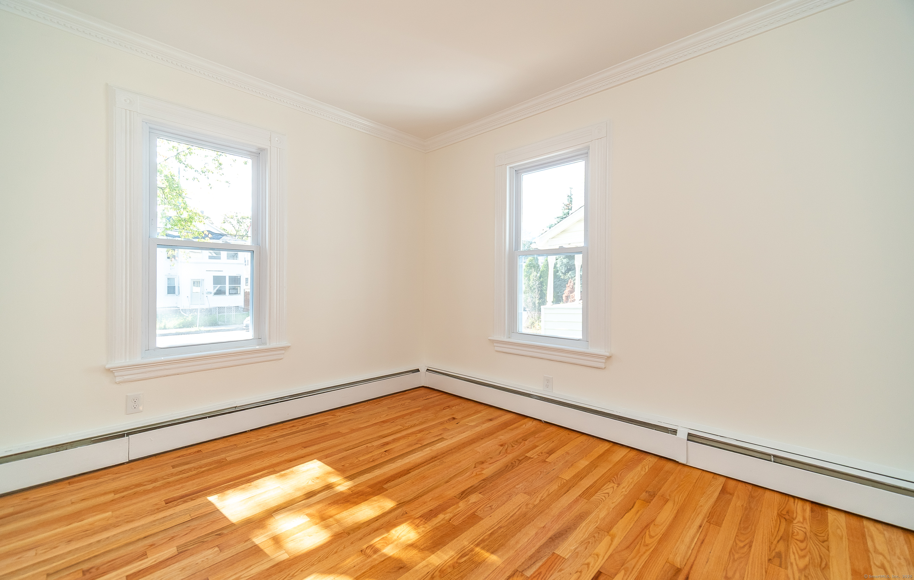 78 Warren Street Stamford, CT 06902 - Photo 16 of 40 an empty room with a window