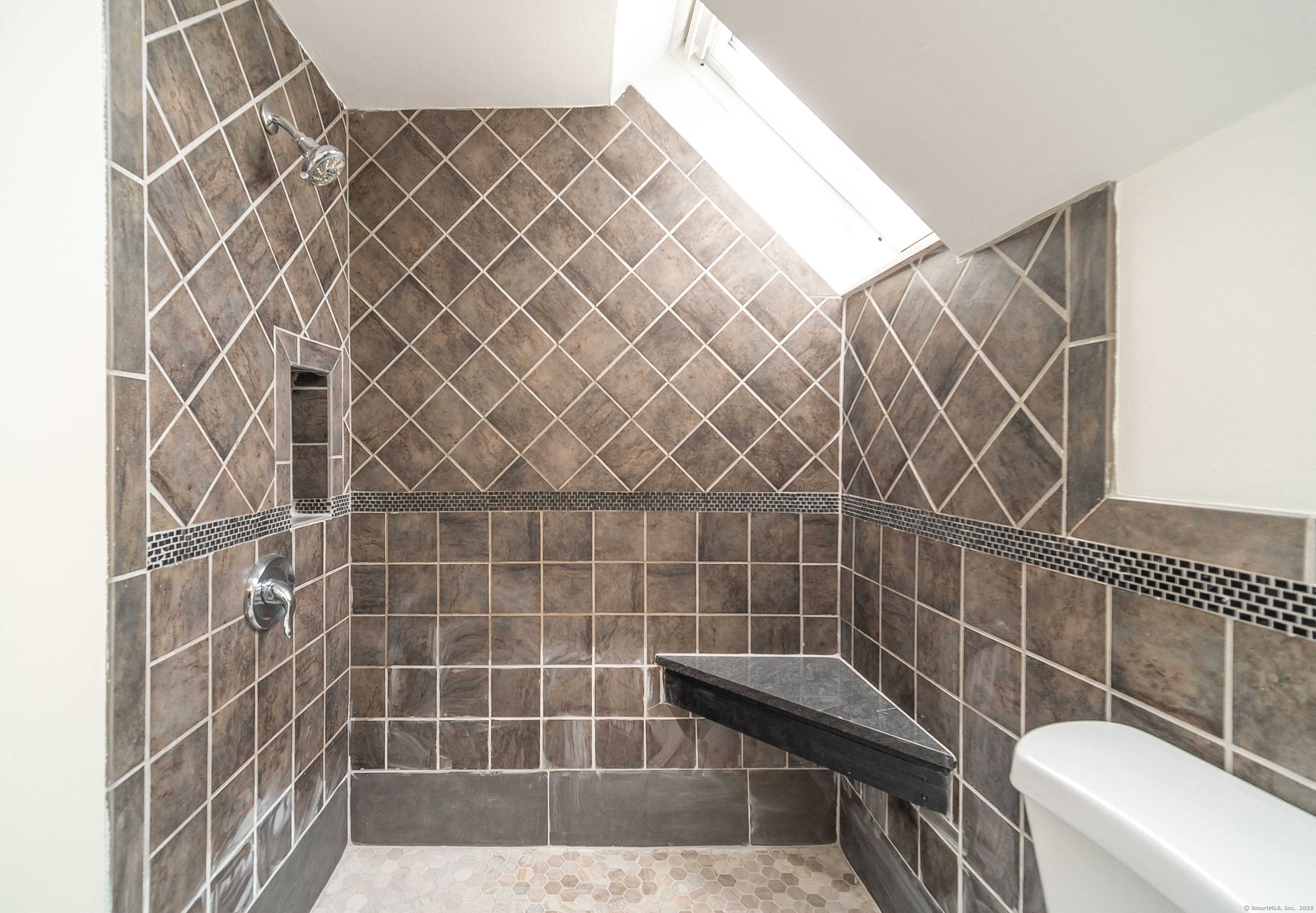 78 Warren Street Stamford, CT 06902 - Photo 24 of 40 a bathroom with a sink and a toilet