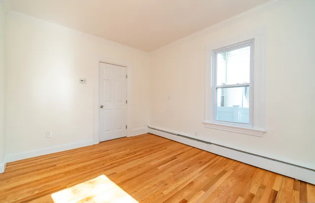 an empty room with window