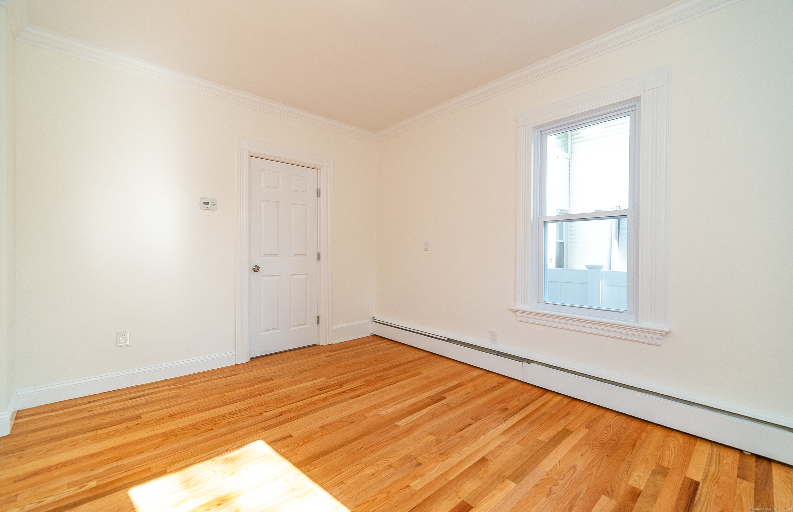 78 Warren Street Stamford, CT 06902 - Photo 26 of 40 an empty room with window