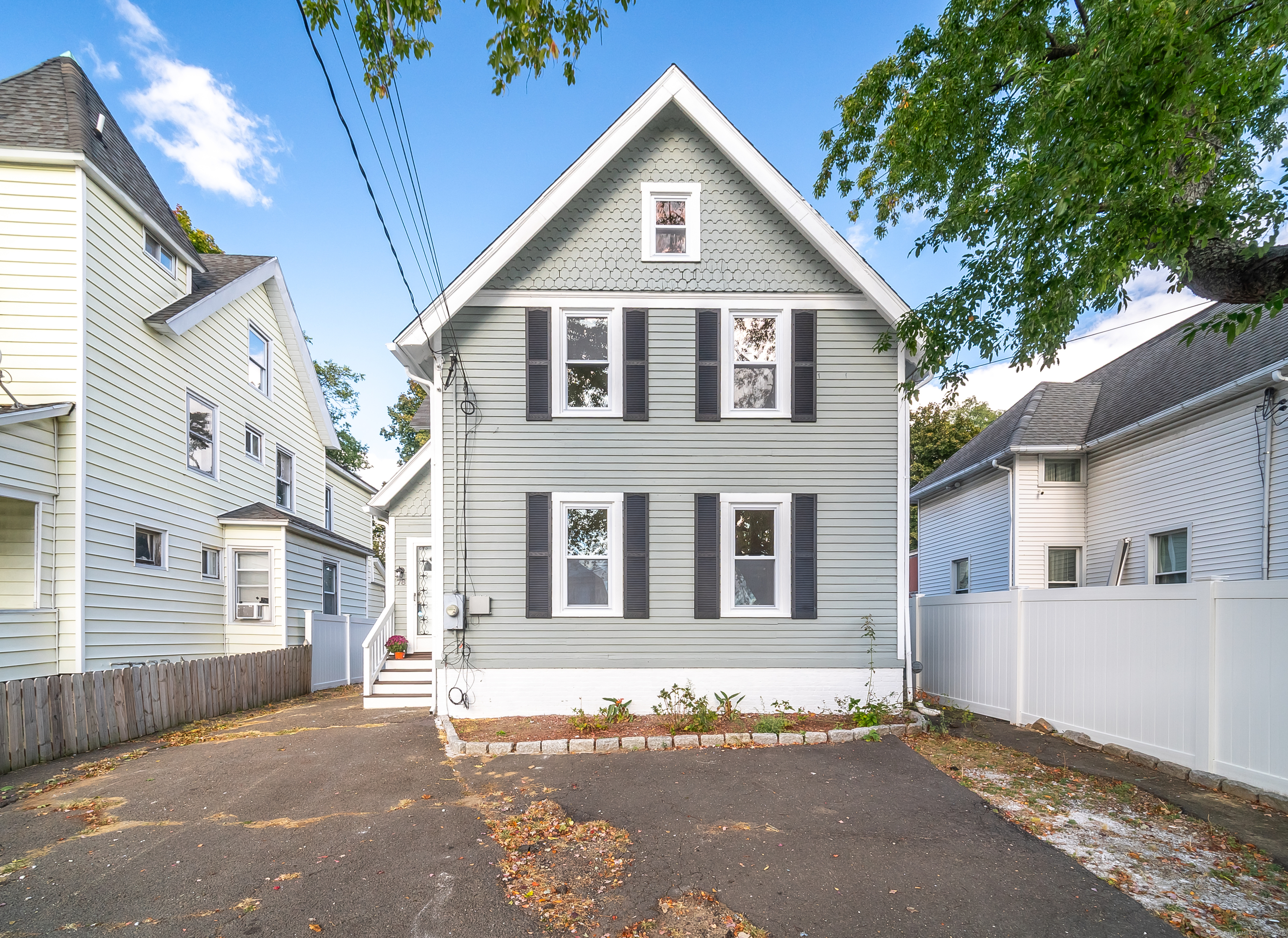 78 Warren Street Stamford, CT 06902 - Photo 40 of 40 a front view of a house with a yard