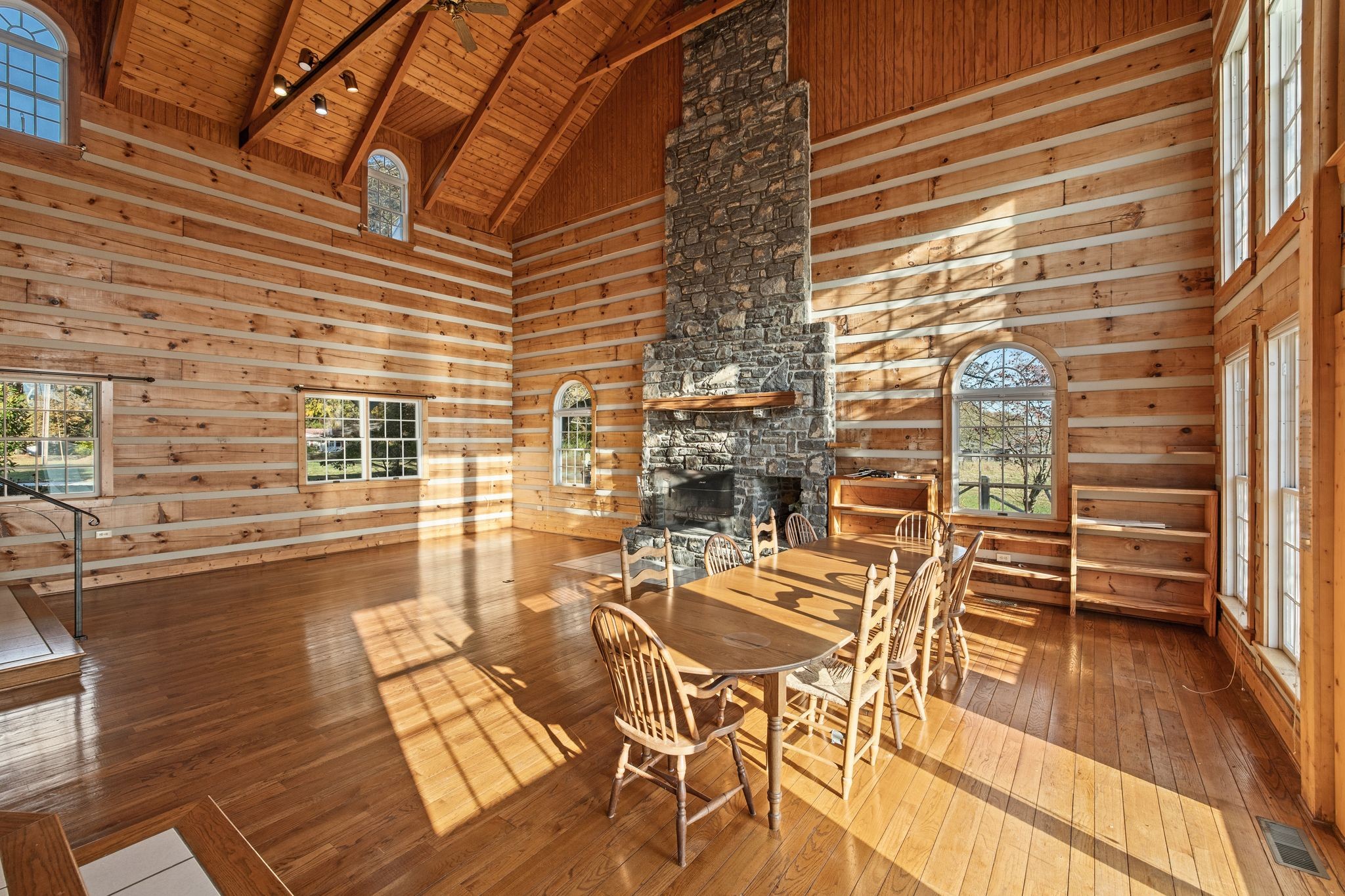 2301 Rock Creek Road Estill Springs, TN 37330 - Photo 15 of 65 a view of a patio with table and chairs and wooden floor