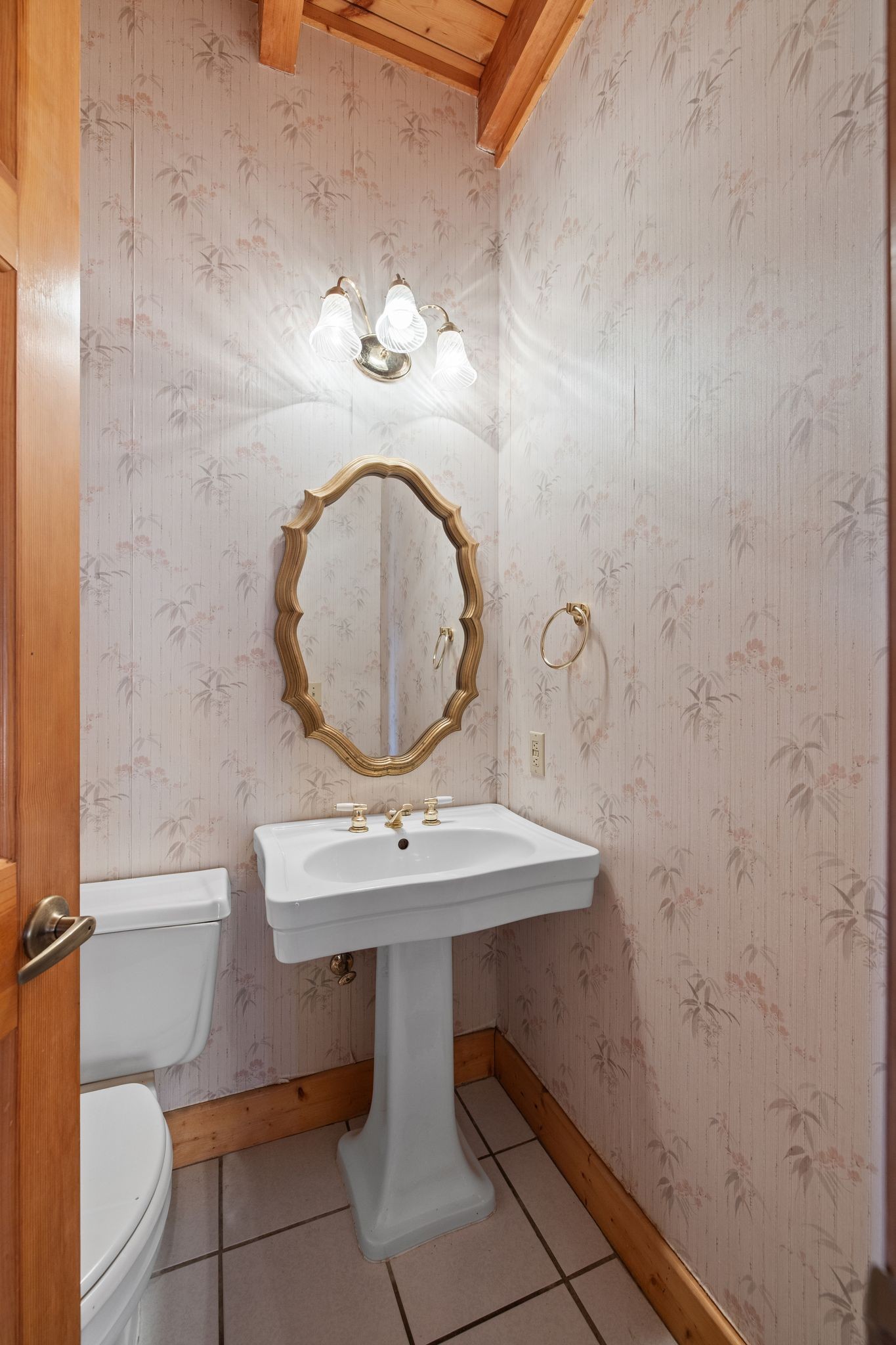 2301 Rock Creek Road Estill Springs, TN 37330 - Photo 25 of 65 a bathroom with a sink mirror vanity and toilet
