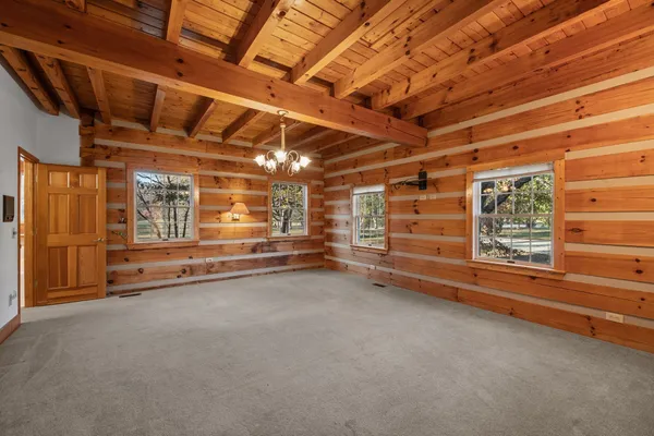 a view of an empty room and window