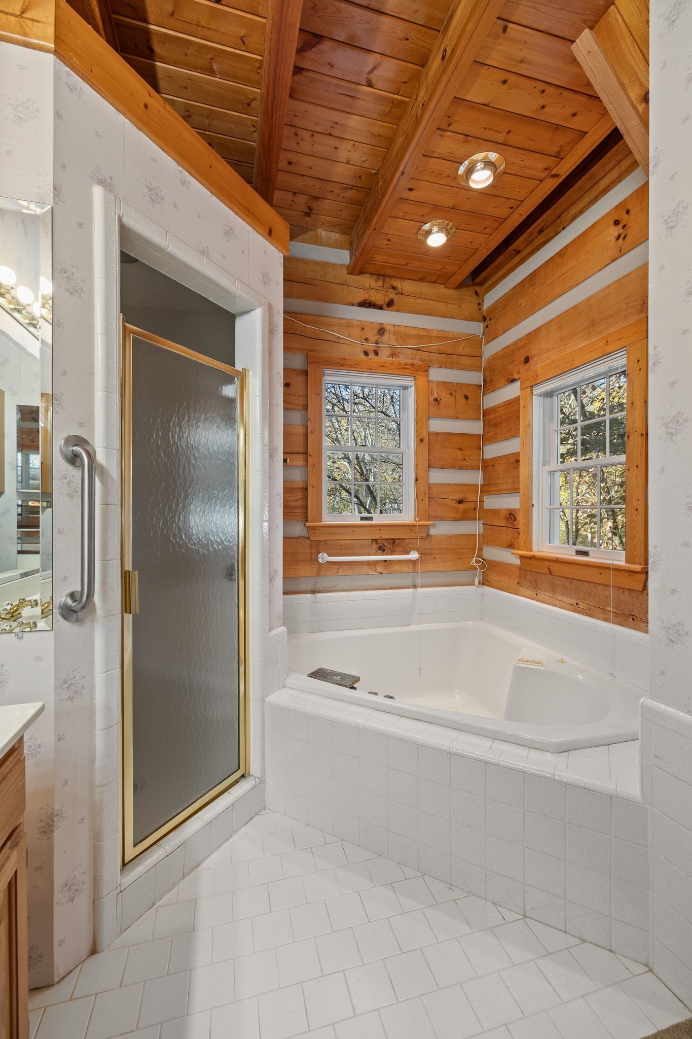 2301 Rock Creek Road Estill Springs, TN 37330 - Photo 30 of 65 a bathroom with a bathtub and a shower