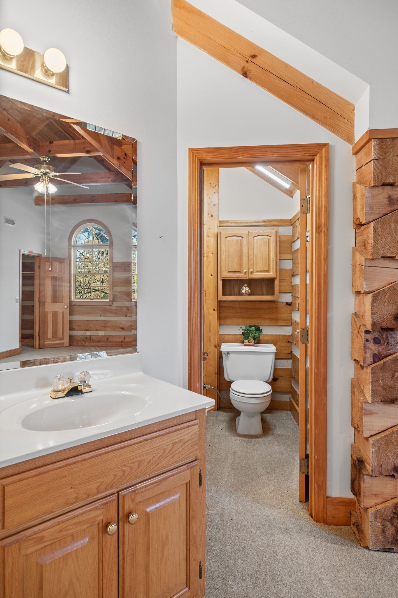 2301 Rock Creek Road Estill Springs, TN 37330 - Photo 39 of 65 a bathroom with a sink and a mirror
