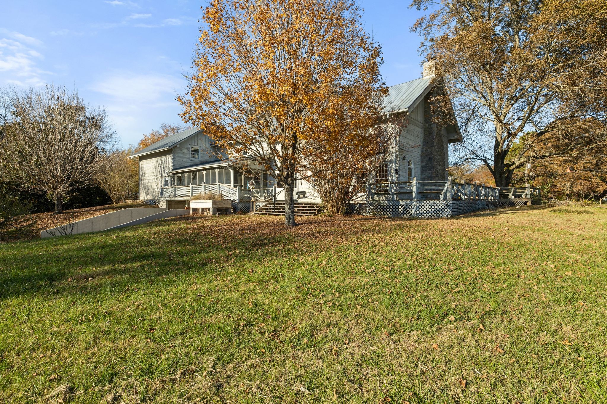 2301 Rock Creek Road Estill Springs, TN 37330 - Photo 50 of 65 a front view of a house with a yard