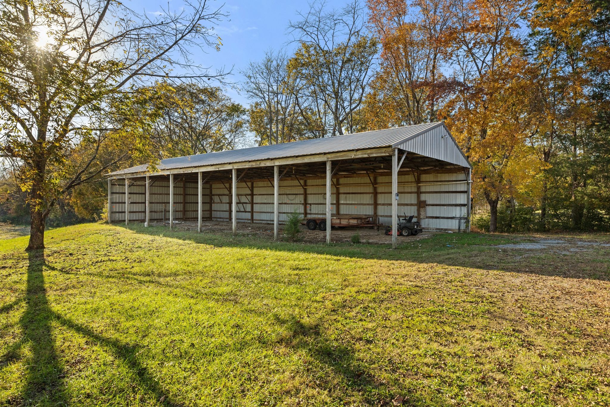 2301 Rock Creek Road Estill Springs, TN 37330 - Photo 54 of 65 a view of a house with a backyard