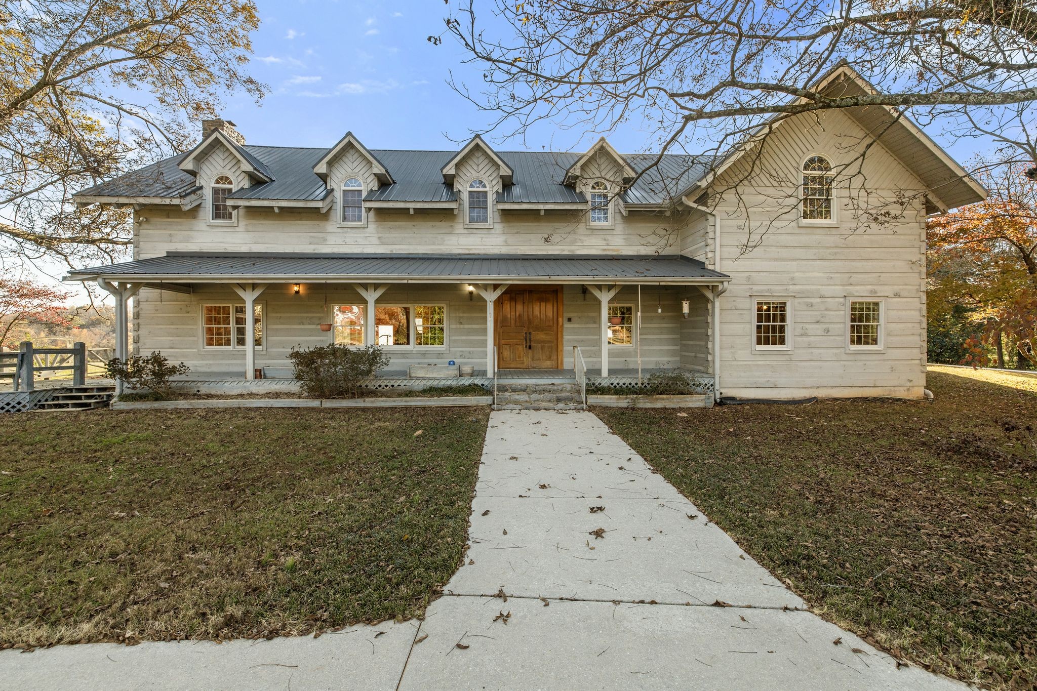 2301 Rock Creek Road Estill Springs, TN 37330 - Photo 6 of 65 a front view of a house with garden