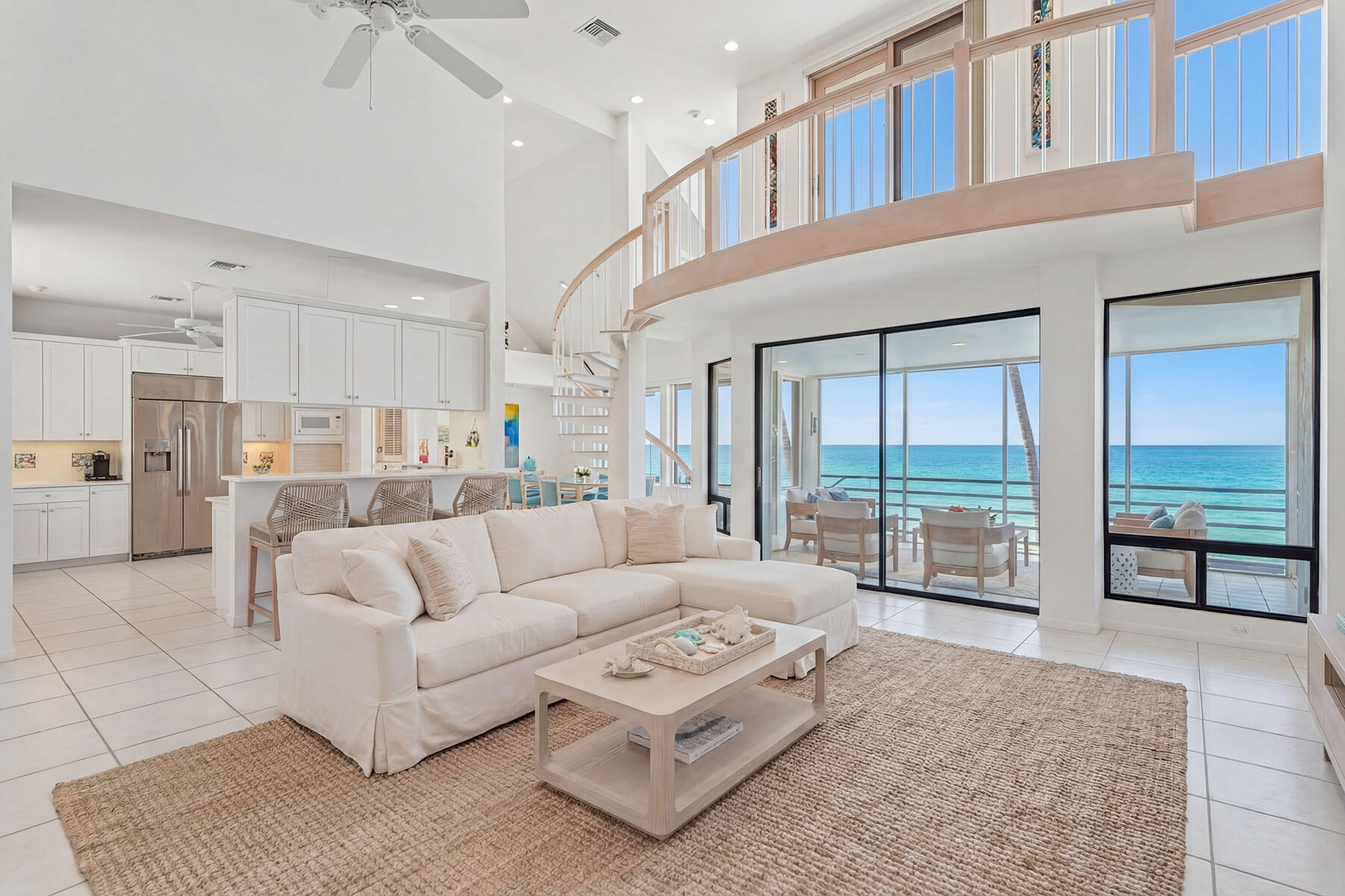 30 3rd Avenue South Naples, FL 34102 - Photo 12 of 17 a living room with furniture and a large window with outer view