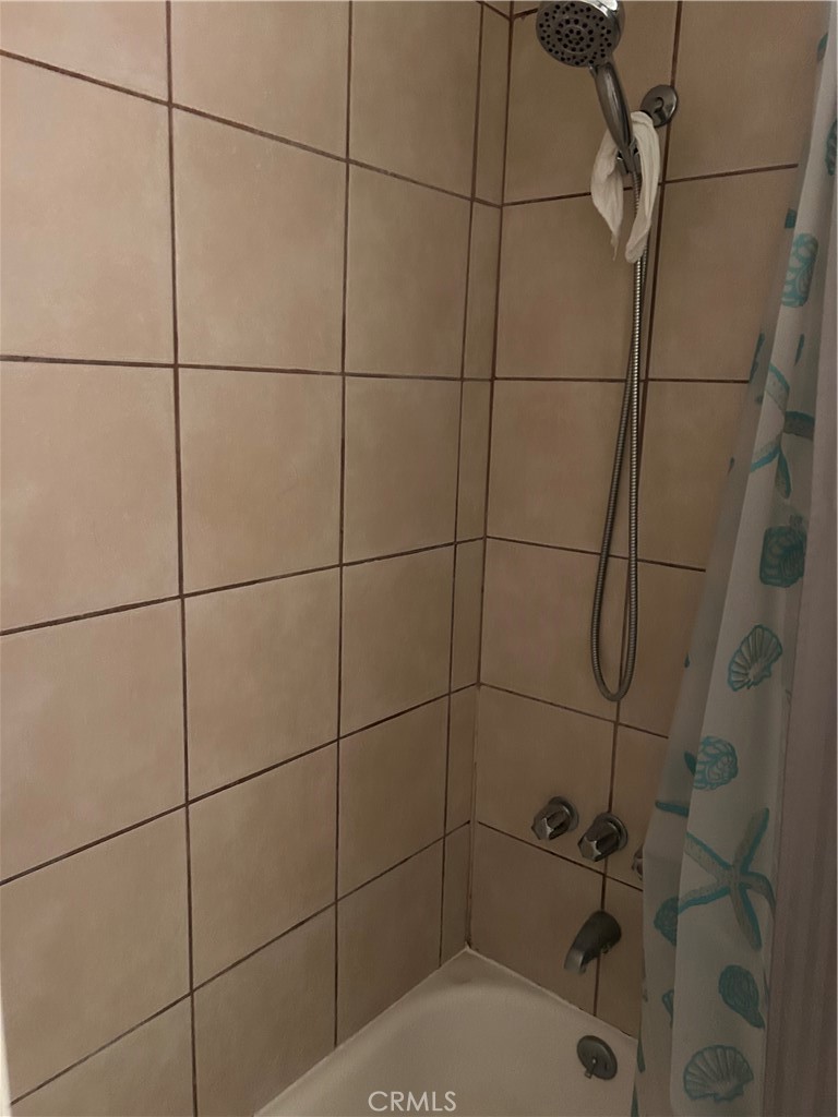 21900 Martin Street, Unit A8 Carson, CA 90745 - Photo 6 of 10 a bathroom with a shower