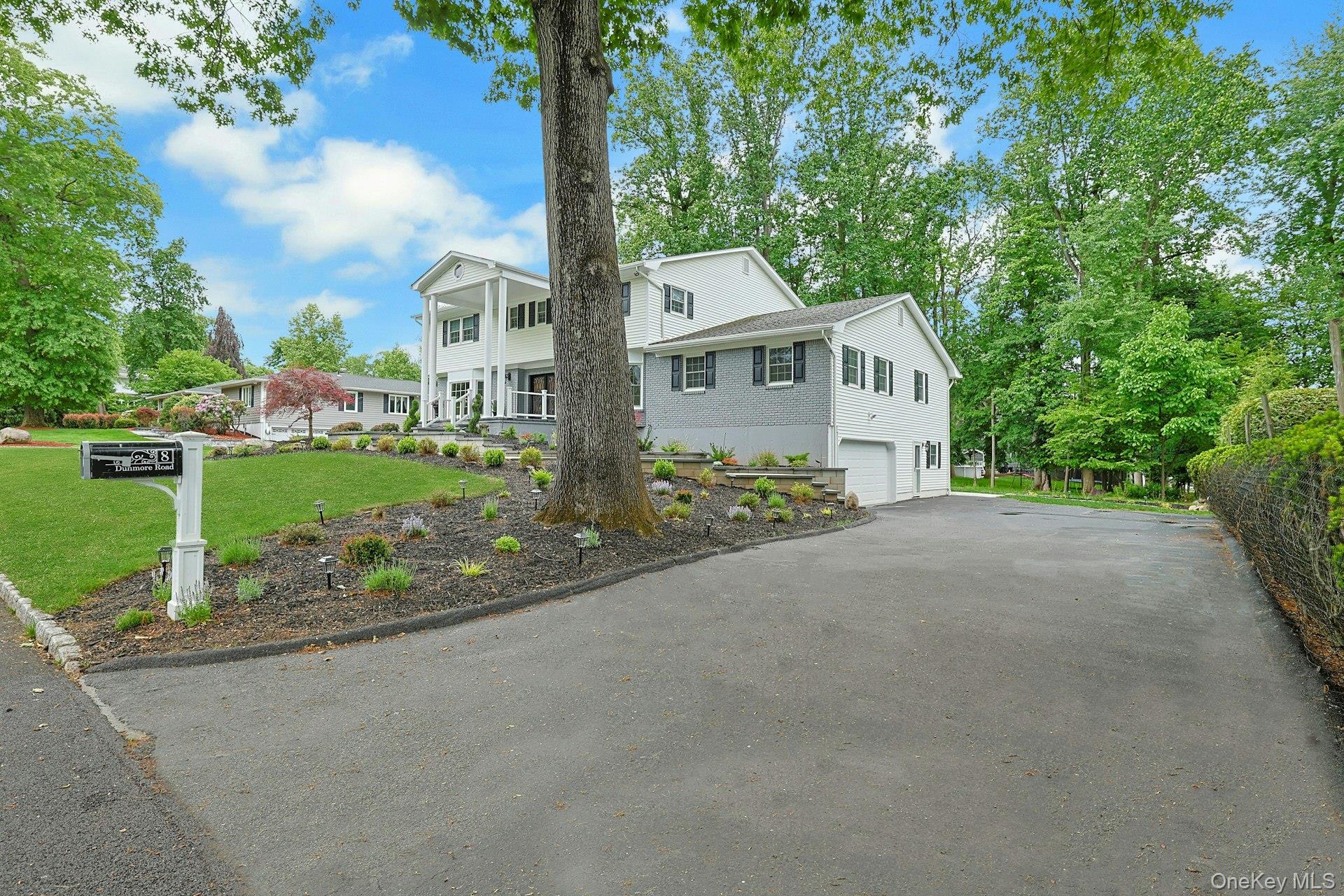8 Dunmore Road New City, NY 10956 - Photo 45 of 48 a front view of a house with a yard and trees