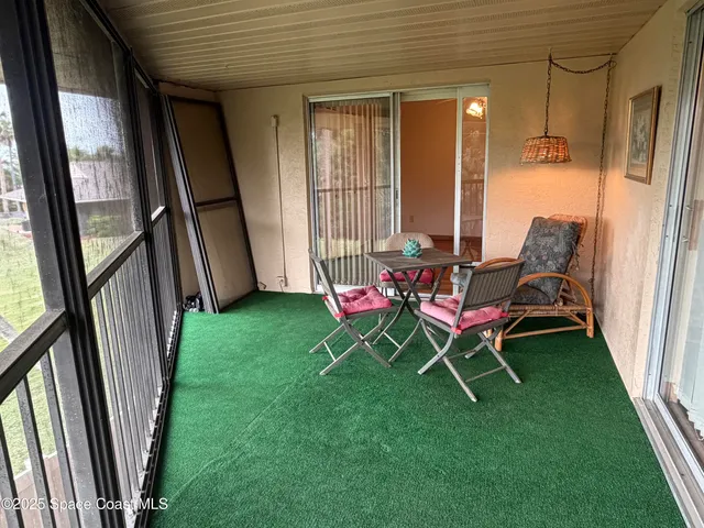 a room with furniture and a window