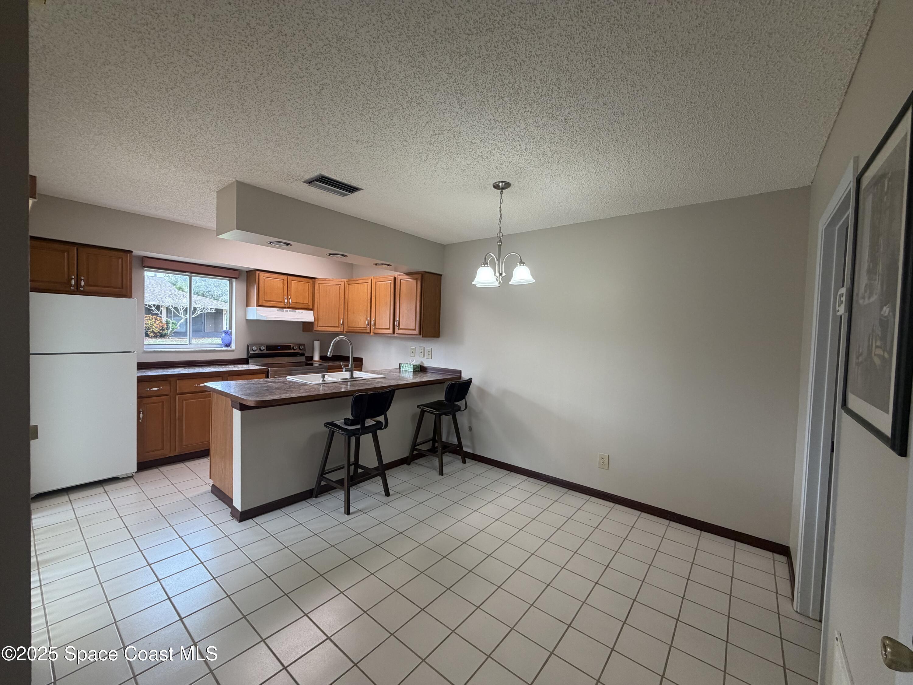 4116 Stock Avenue, Unit 504 Rockledge, FL 32955 - Photo 4 of 29 IMG_1987