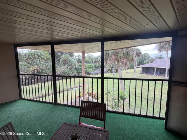 a view of a porch with furniture