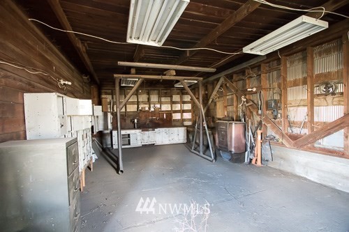 408 & 410 Emerson Road Pomeroy, WA 99347 - Photo 21 of 35 a view of empty room with wooden floor