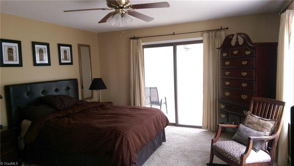 6908 Ridge Road Tobaccoville, NC 27050 - Photo 4 of 20 Master Bedroom leading out into deck