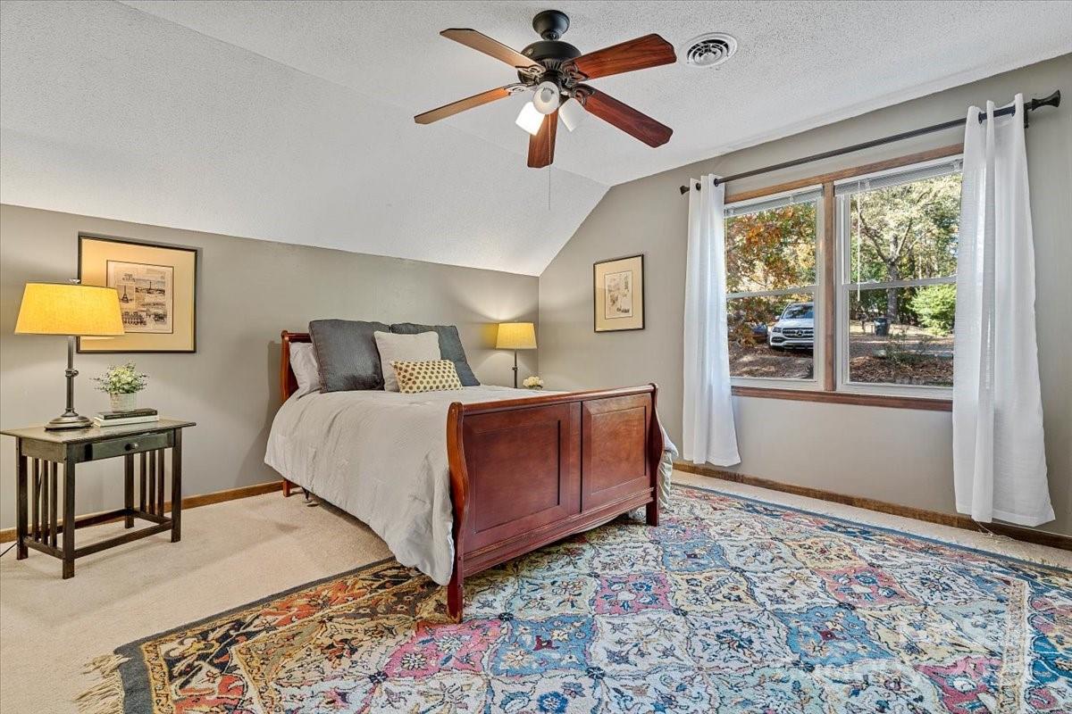 5084 Mariana Court Tega Cay, SC 29708 - Photo 15 of 33 a bedroom with a bed and a window