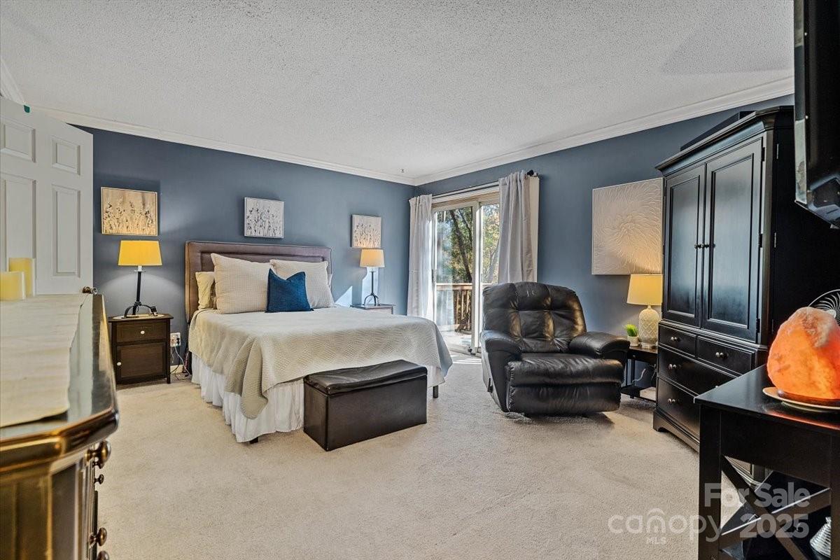 5084 Mariana Court Tega Cay, SC 29708 - Photo 17 of 33 a bedroom with bed and window