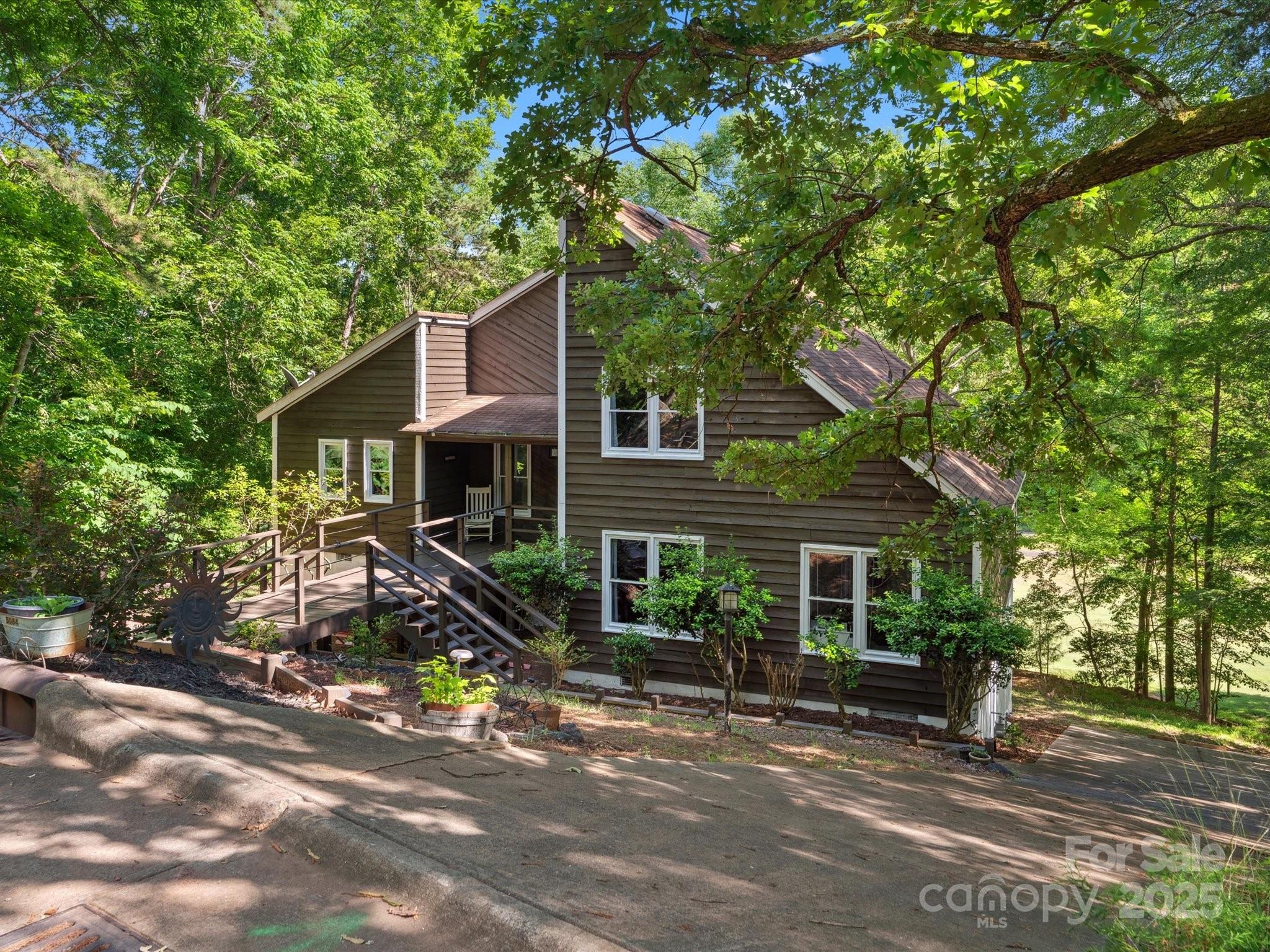 5084 Mariana Court Tega Cay, SC 29708 - Photo 2 of 33 a front view of a house with a yard