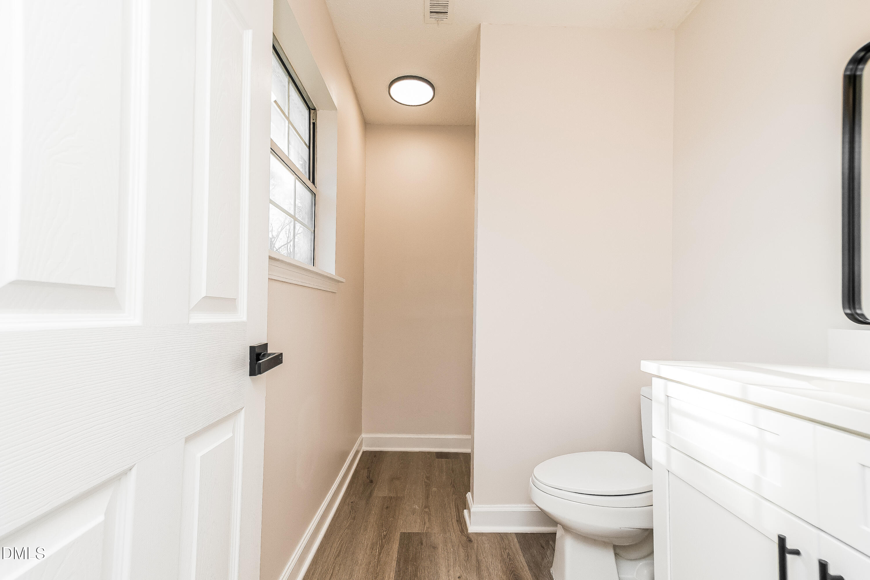 418 Craven Street Durham, NC 27704 - Photo 6 of 14 a bathroom with a toilet and a shower